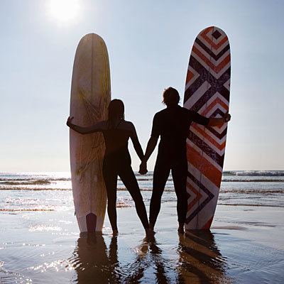surfing-couple-handholding-400x400
